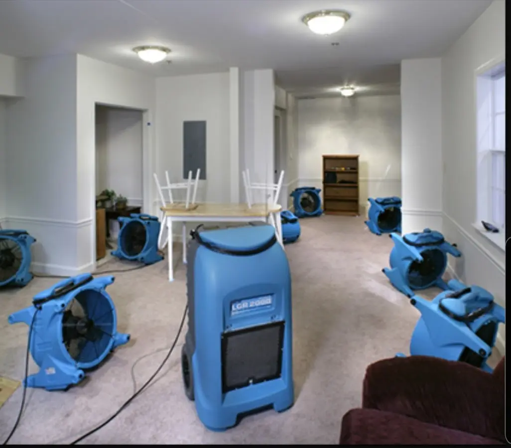 Air movers and dehumidifier setup for Water Damage Restoration in Potsdam